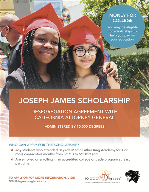 Joseph James Scholarship - 2 smiling girls wearing red graduation caps